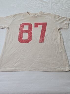 Grayson Threads Cream Tee with Distressed Red '87' Graphic